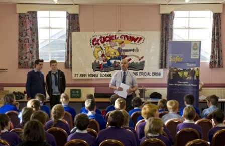 Paul Stephenson addressing school children at the Crucial Crew event