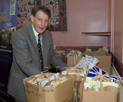 Alan Drinkall helping with goody bags for the children