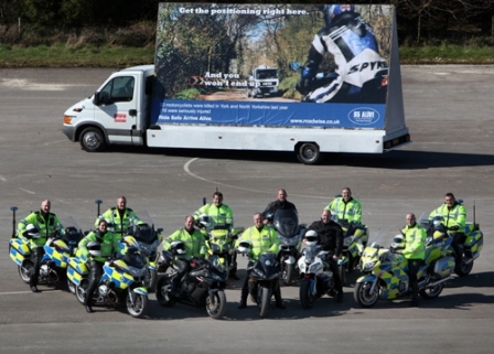 Inspector Dave Brown (centre) with roads policing officers from North Yorkshire, South Yorkshire and Humberside and the "95 Alive" campaign vehicle