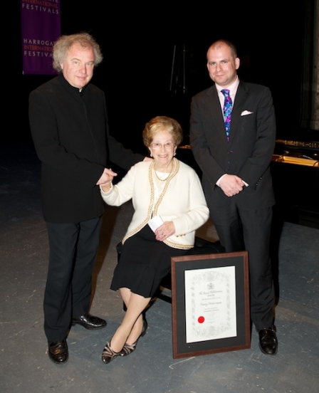 Dame Fanny Waterman receives her award from John Gilhooly (right) with Andras Schiff (left)
