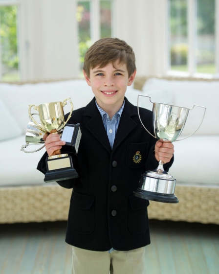 Young Performer – home educated Oliver Teasdale with his three trophies