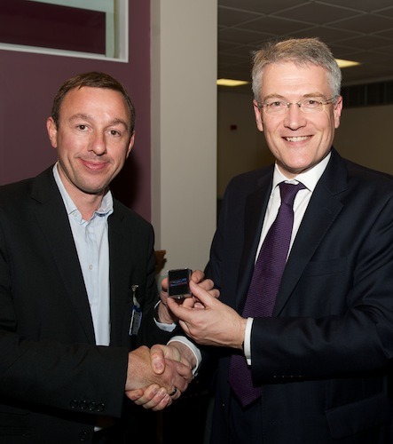 David Simister receives 20-years long service award from MP Andrew Jones