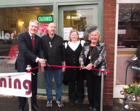Andrew Jones MP, Michael Miller, Mrs Miller and Councillor Pat Jones cut the ribbon to open the café