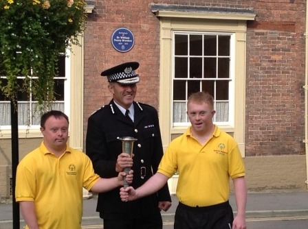 DCC Madgwick at the torch lighting ceremony with athletes Bobby Dunbar and Greg Silvester