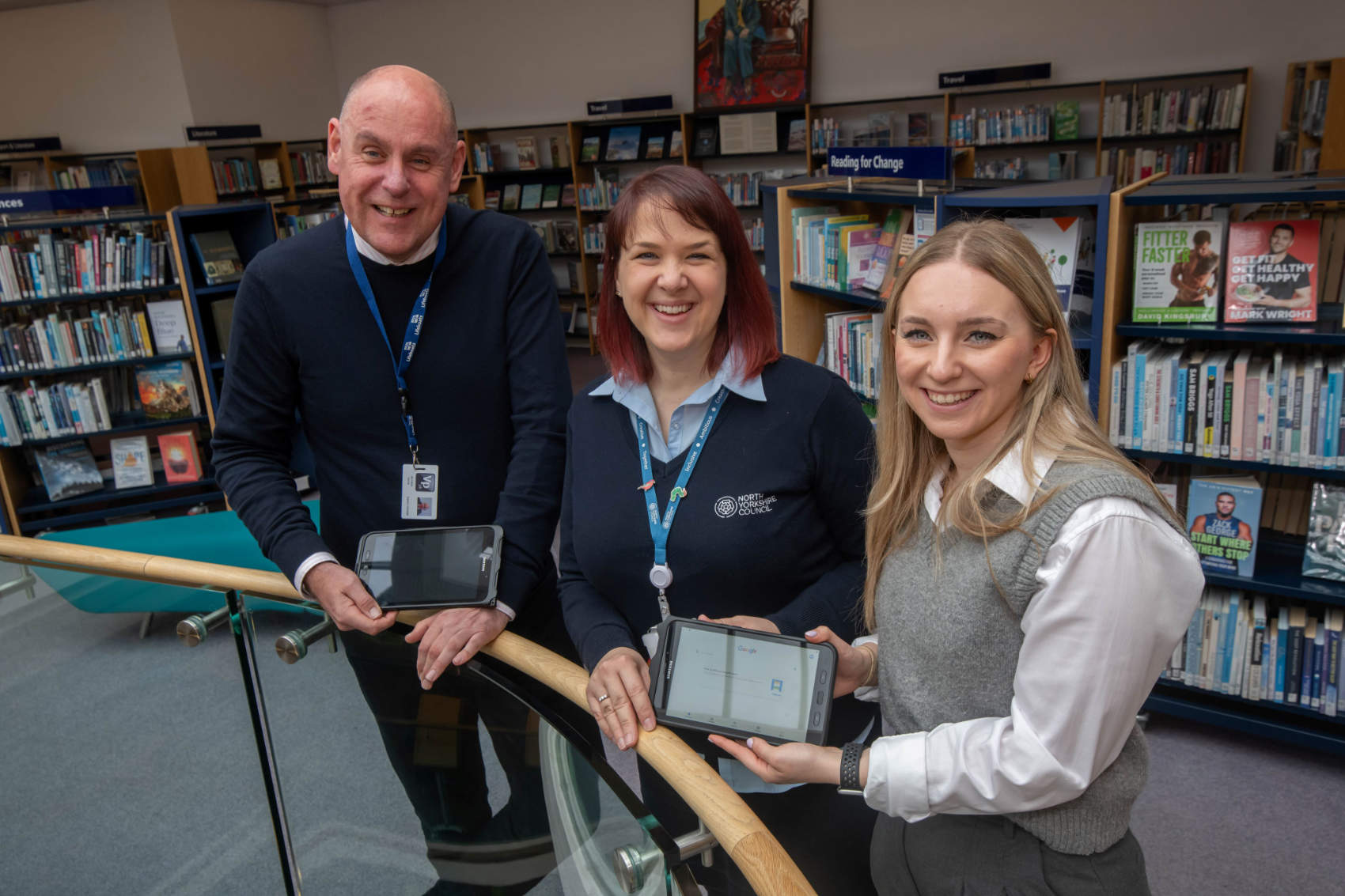 Vp plc’s group risk and sustainability director, Mathew Wood, North Yorkshire Council’s library supervisor at Harrogate Library, Catherine Skyvington, and Vp plc’s group risk and sustainability officer, Ellie Rose, at Harrogate Library where tablet computers were handed over to the Reboot North Yorkshire scheme