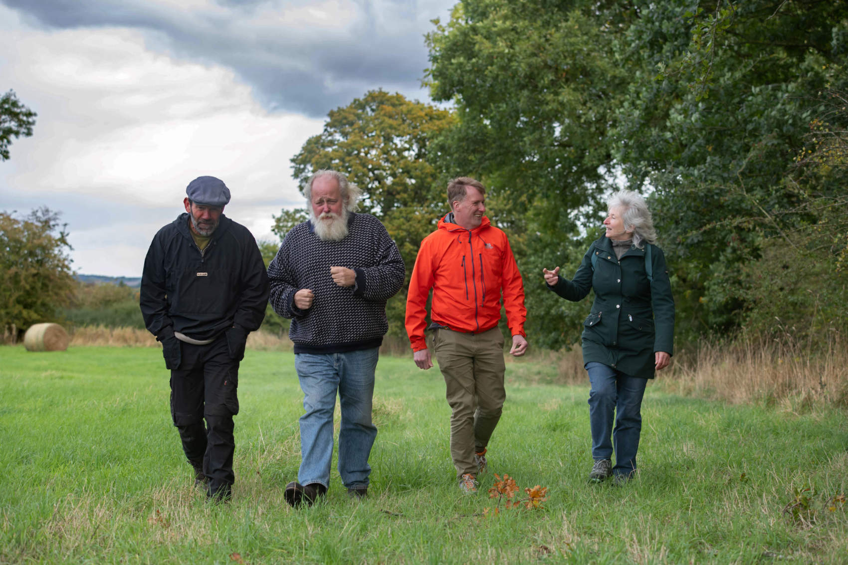 Chris Kitson, from Long Lands Common, Cllr Arnold Warneken, Cllr Matt Walker and Alison Organ, also from Long Lands Common, walking through the open fields at Knaresborough Forest Park