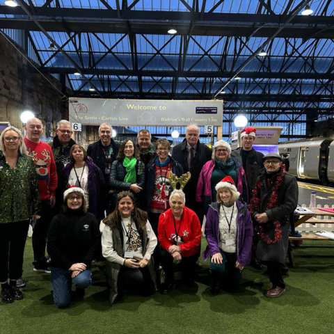 Settle Carlisle Development Company team and volunteers pictured at The Citadel railway station in Carlisle ahead of their chartered Festive Special Steam Train last year