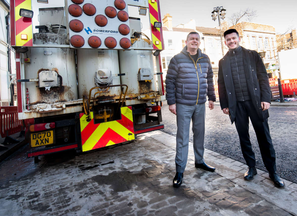 Cllr Andrew Williams (left) and Cllr Keane Duncan assessing the final stage of resurfacing and lining work